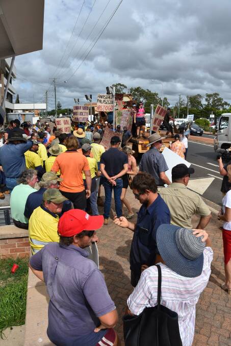OUTRAGE: Farmers and residents gathered outside the Bundaberg Court House in March to protest the lowering of the Paradise Dam. 