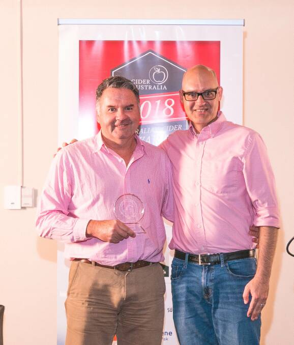 TOP DROP: Ian Cameron, Westons Australia is congratulated on winning the Best International Cider or Perry award by guest international judge, Eric West.
