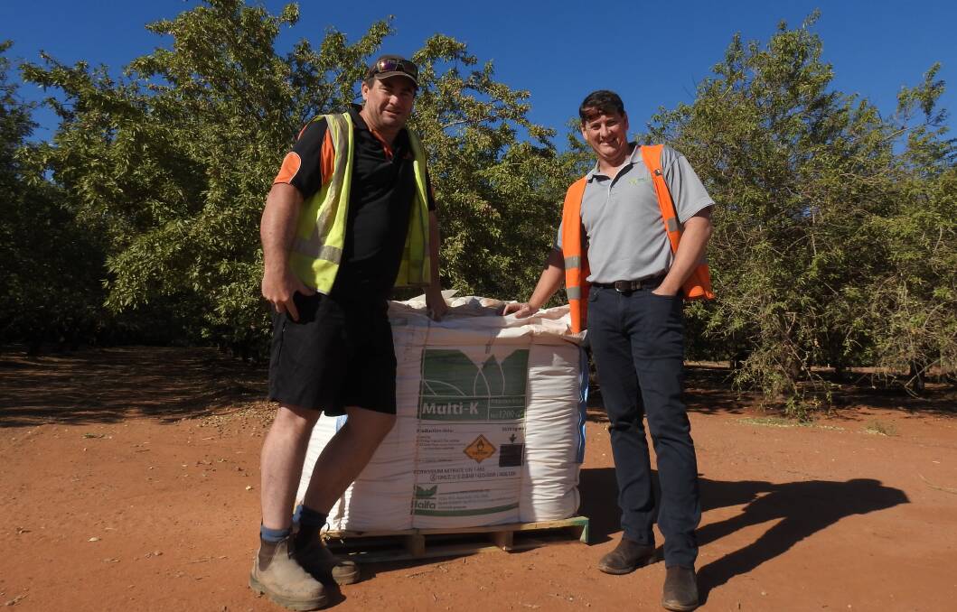 SIGNED ON: Victorian operations manager with almond company, Select Harvests, Jason Robinson, with Stephen Richards of Farm Waste Recovery (FWR). The almond industry is keen to be involved in the FWR program and fertiliser package recycling.