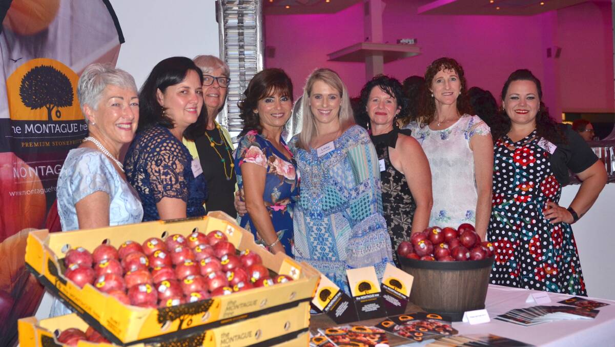 CELEBRATION: Southern Downs mayor Tracy Dobie, Toni Nicoletti, Nicoletti Orchards, Dinie Ferrier Rosemary Hill Orchard, Mira Milich, Divine Fruits, Kumbia growers Libby Dugdell, Teresa Francis, Sue Francis and Kristy Board, South Burnett Regional Council. 