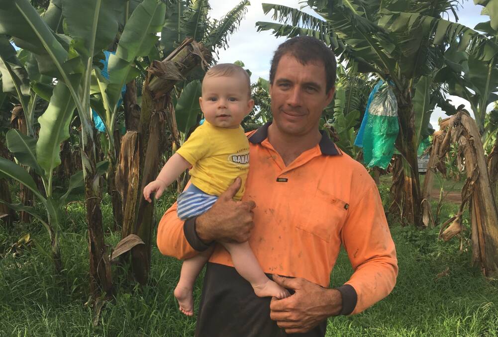 BRANDING: Banana grower and Nuffield Scholar, Matthew Abbott, pictured with his son William, says Australian bananas could do with better branding. 