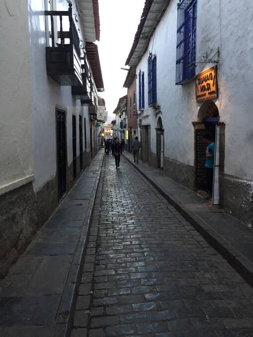 DOWN TOWN: A typical Cusco street which are generally shared by both vehicles and humans, each at their own risk.  