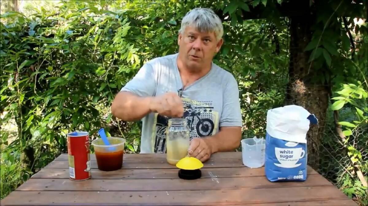 TRAP SNAP: A screenshot from the AgriFutures’ instructional video featuring Phil Bowman, Stradbroke Island Organic Honey, demonstrating how to make a small hive beetle trap. 