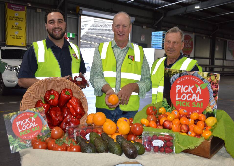 Joseph Ceravolo, Ceravolo Orchards, Ashton, Mark Doecke, Waikerie, and Tim Grieger, Renmark, say the benefits to fruit and vegetable growers with a dedicated biosecurity facility in Adelaide will be great. Picture by Elizabeth Anderson