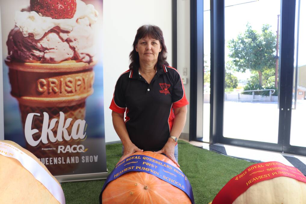 Erica Cook, from Bullyard State School, with the 1st place pumpkin in the schools class.