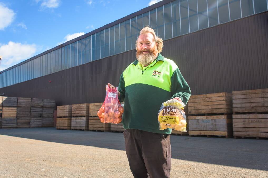 North-West Growth: Terrence Rattray at his Yum Tasmanian Gourmet Potato factory at East Devonport recently purchased Perfecta Produce diversifying into onions and cherries. Picture: Simon Sturzaker