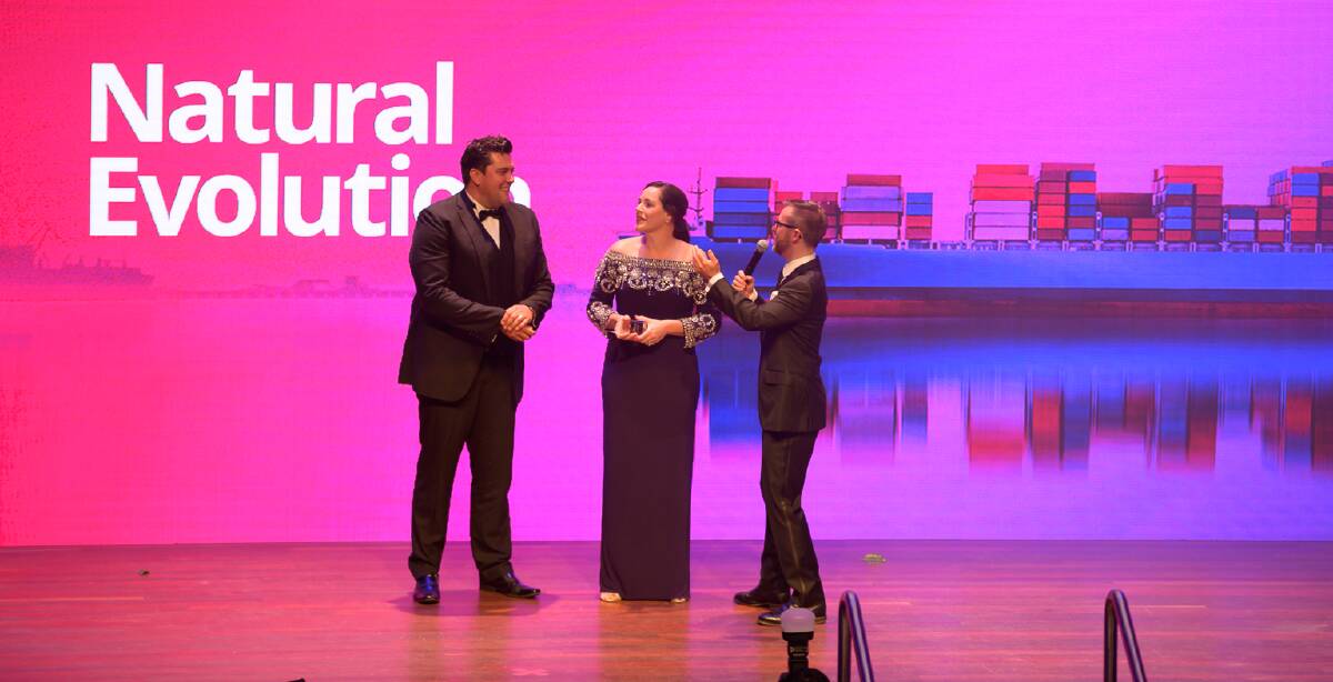 WINNERS: Rob and Krista Watkins, Natural Evolution, speak to MC Craig Zonca, after receiving their Emerging Exporter Award. 