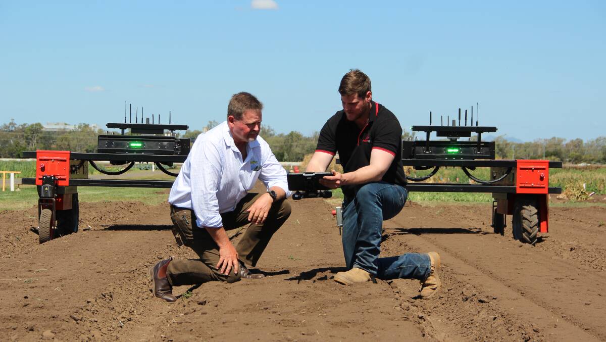 DETAIL: Kalfresh CEO Richard Gorman finds out how the Agerris Digital Farmhand is controlled by Agerris robotics technician and operator Andrew Whiteside.