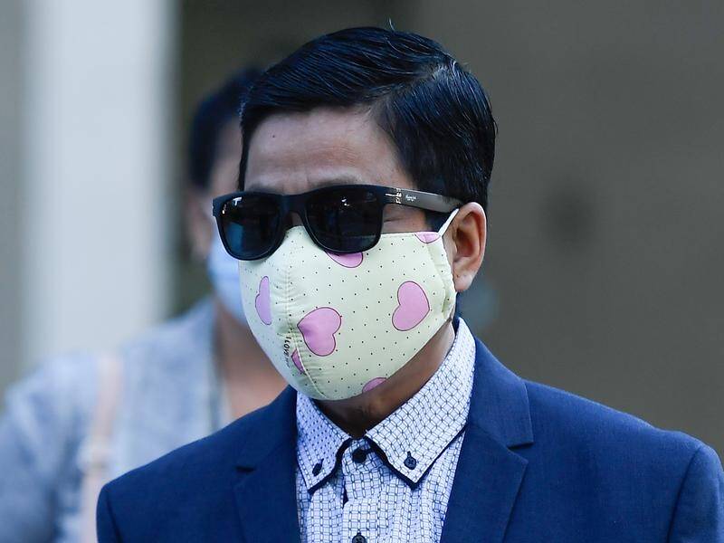 My Ut Trinh has walked from court after having charges dropped over putting needles in strawberries.