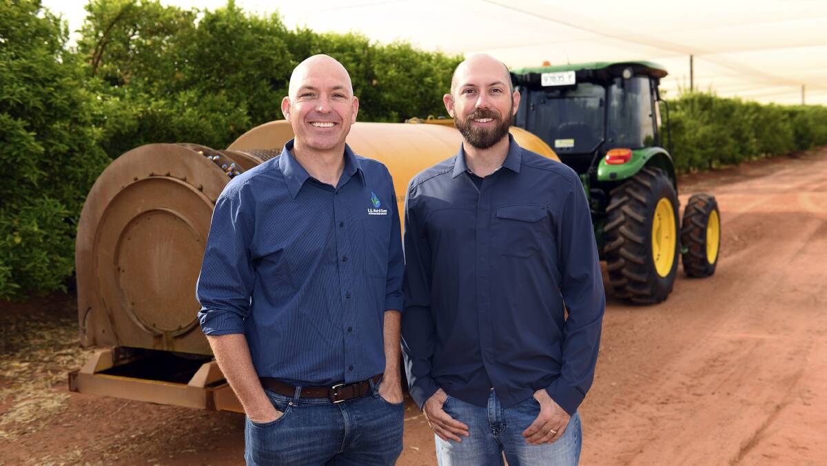 AWARDED: EE Muir & Sons regional manager Danny Thornton and Matt Strmiska, of Adaptiv, after EE Muir and Sons was awarded the Environmental Respect Award for the Asia-Pacific region.