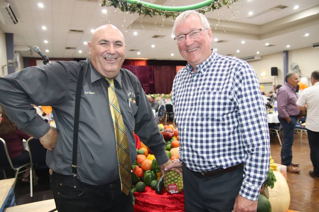 ALIGNED: FNQ Growers chair Joe Moro and Growcom chief executive officer David Thomson celebrate the signing of the memorandum of understanding.