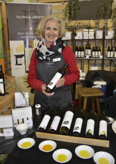 Talinga Grove's Christine Gilliver with Strathalbyn olive oil products.