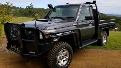 RURAL CRIME: Police are appealing for assistance to help locate a stolen Toyota LandCruiser being driven by a man armed with a rifle.