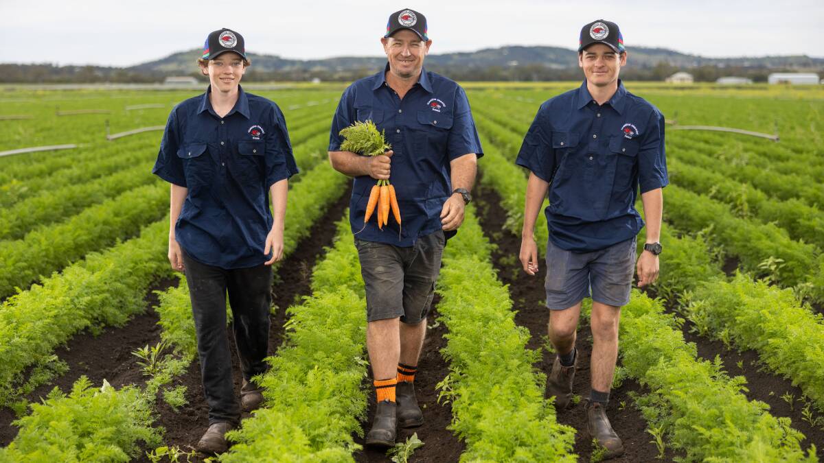 Bryce, Troy and Jake Huggins are helping Coles meet the ever increasing demand for organic produce. Picture supplied
