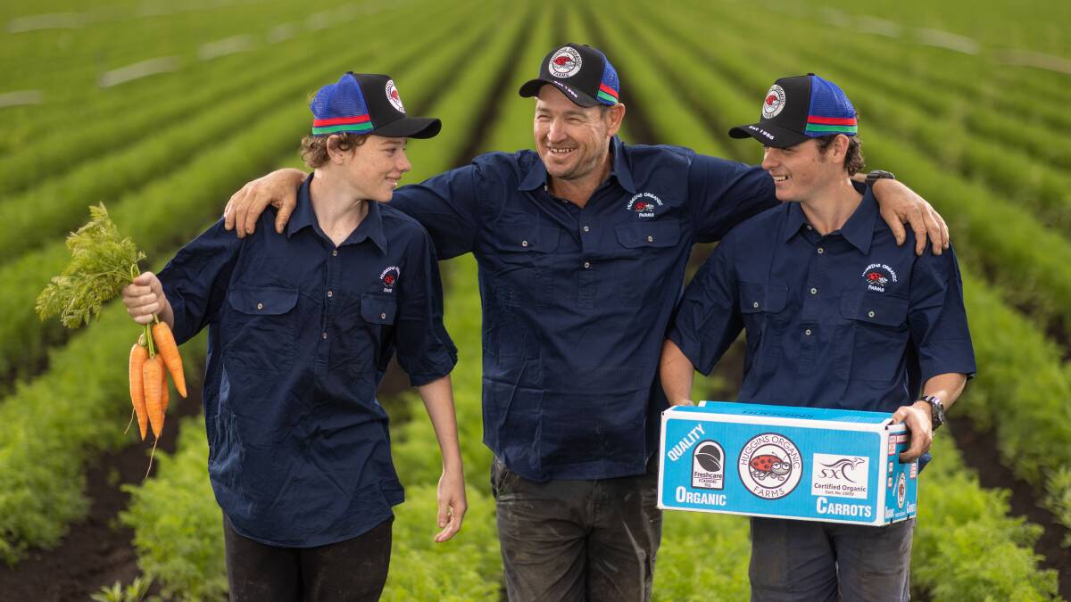Queensland farmers Bryce, Troy and Jake Huggins are part of Coles's strategy to increase the amount of organic fruit and vegetables available to Australian consumers. Picture supplied